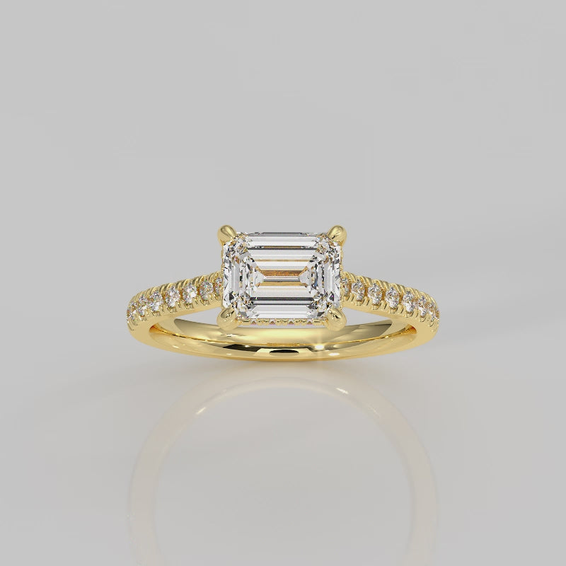 The East West Emerald with Side Stones and Diamond V